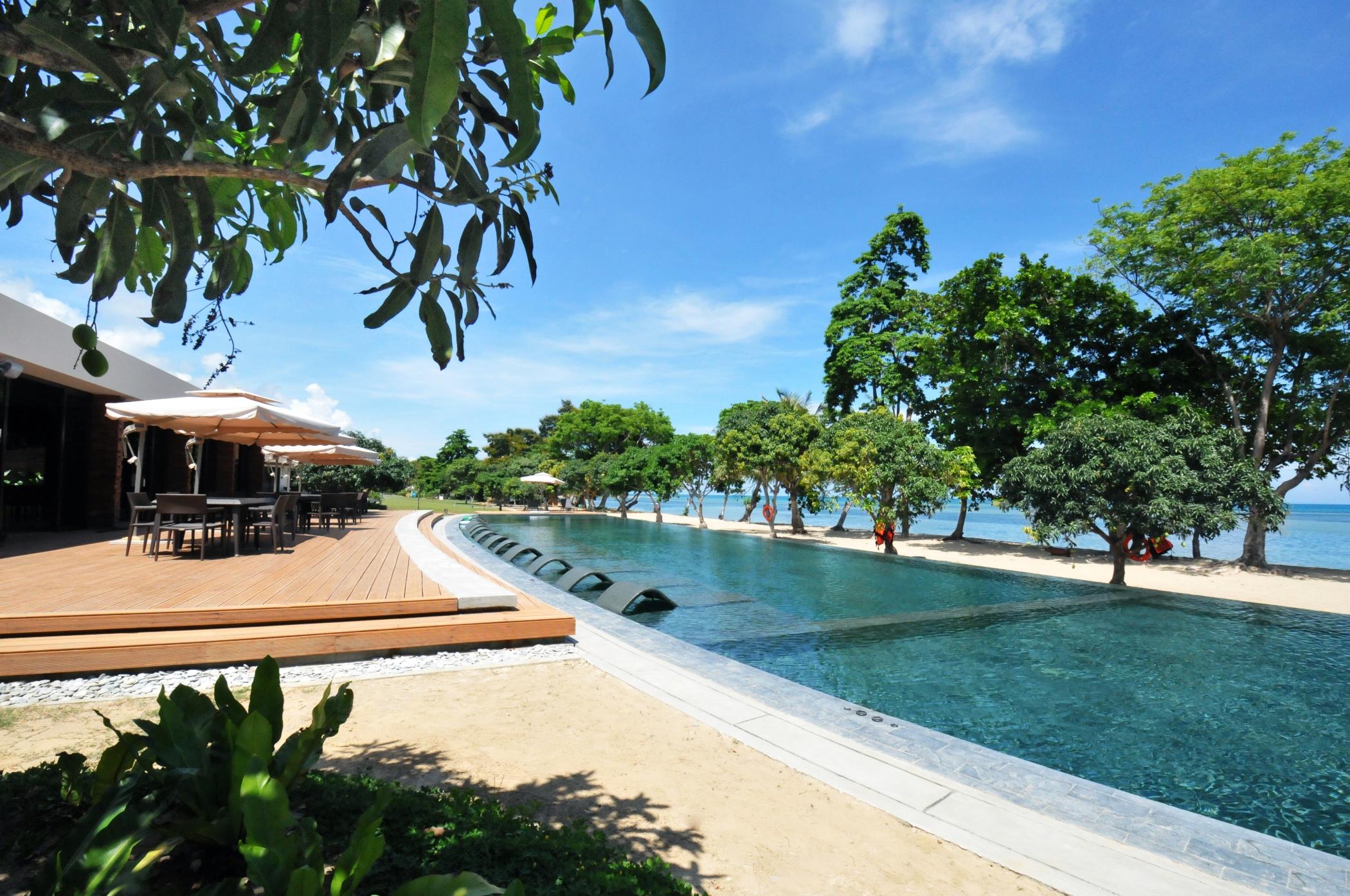 Astoria Palawan Hotell Puerto Princesa Exteriör bild The beach at the resort